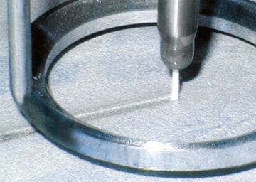 Close-up of the waterjet during cutting.