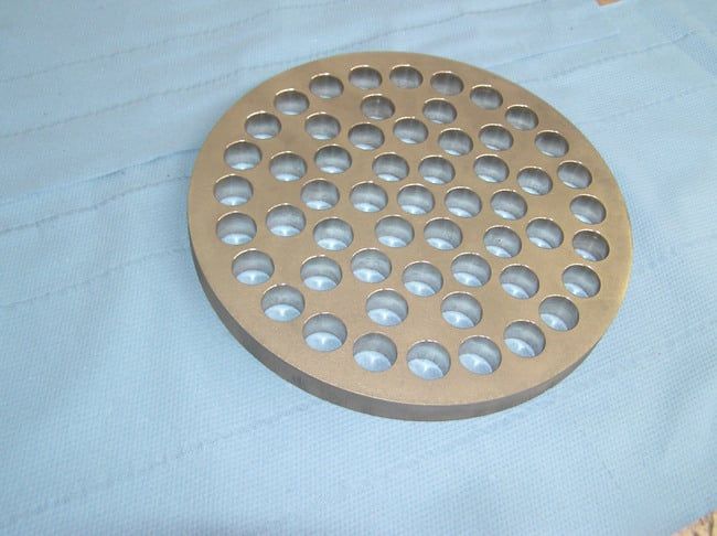 Bores Ø 18.25 mm, tolerance ±0.05 mm, CNC-drilled.